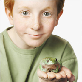 Boy with pet frog